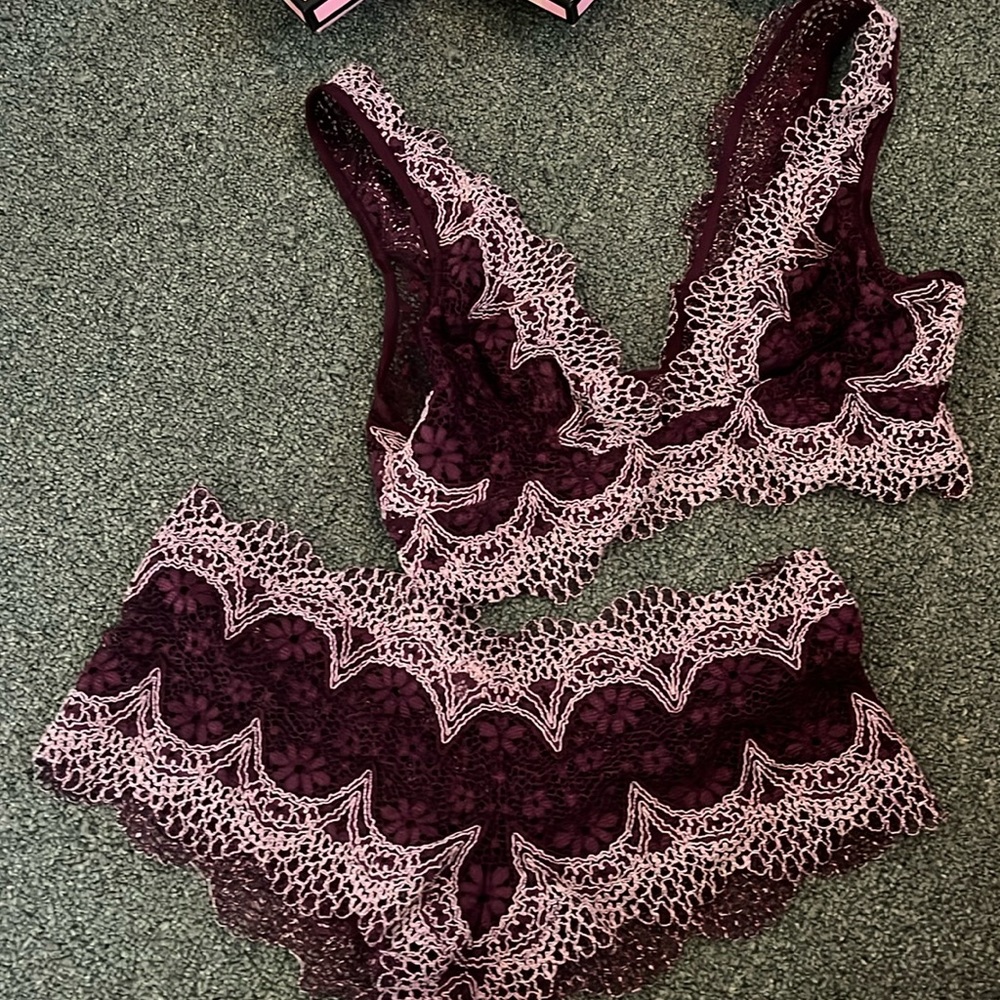 small, burgundy lace Victoria’s Secret bralette